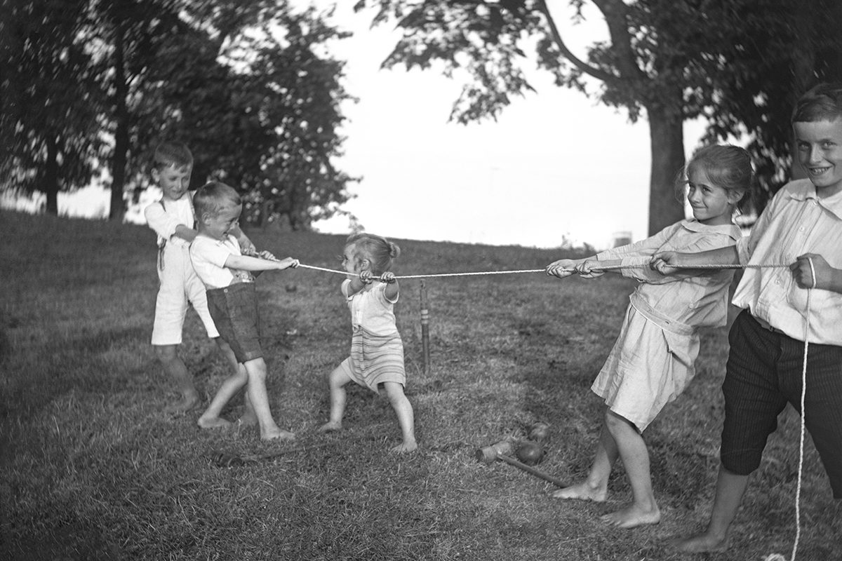 Édouard Stanislas Desbarats, <i>Children playing tug-of-war, Georgeville</i>, about 1905, reversed glass plate negative (10.2 × 12.7 cm), gift of Ned Desbarats, McCord Museum, M2012.56.22